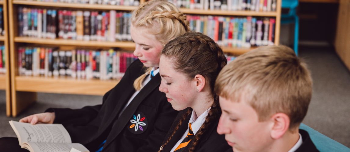 Students reading in library 